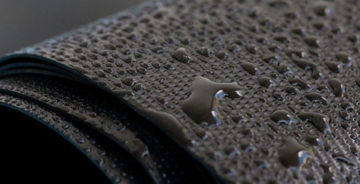 Waterproofing material with water droplets