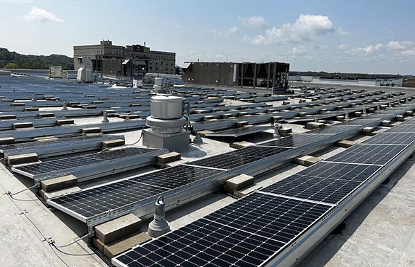 Solar panels on an industrial rooftop